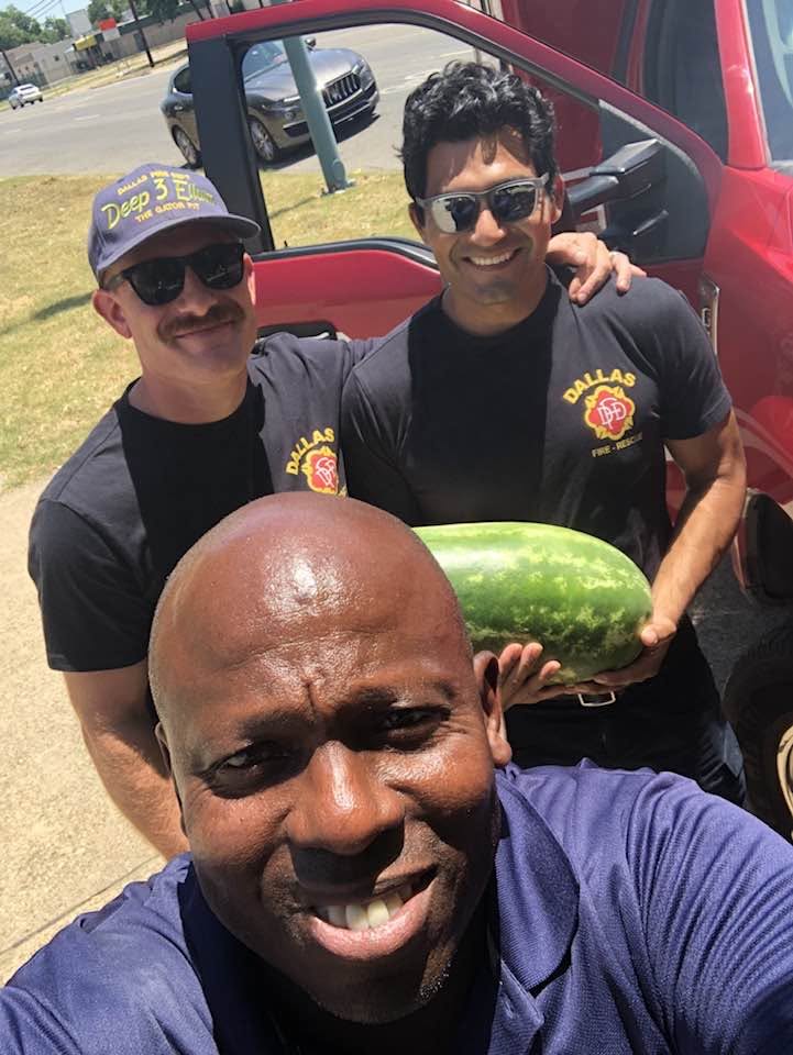 Dallas Fire-Rescue crew holding a Straight D.R.O.P. watermelon